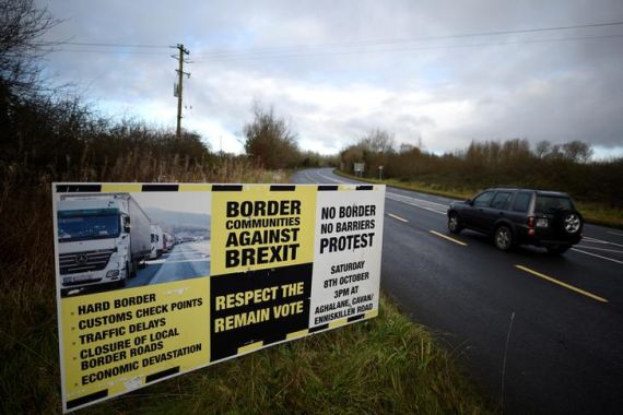 A sign from Border Communities Against Brexit is seen on the borderline between County Cavan in Ireland and County Fermanagh in Northern Ireland near Woodford